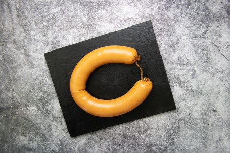 Schinkenfleischwurst im Ring mit Knoblauch